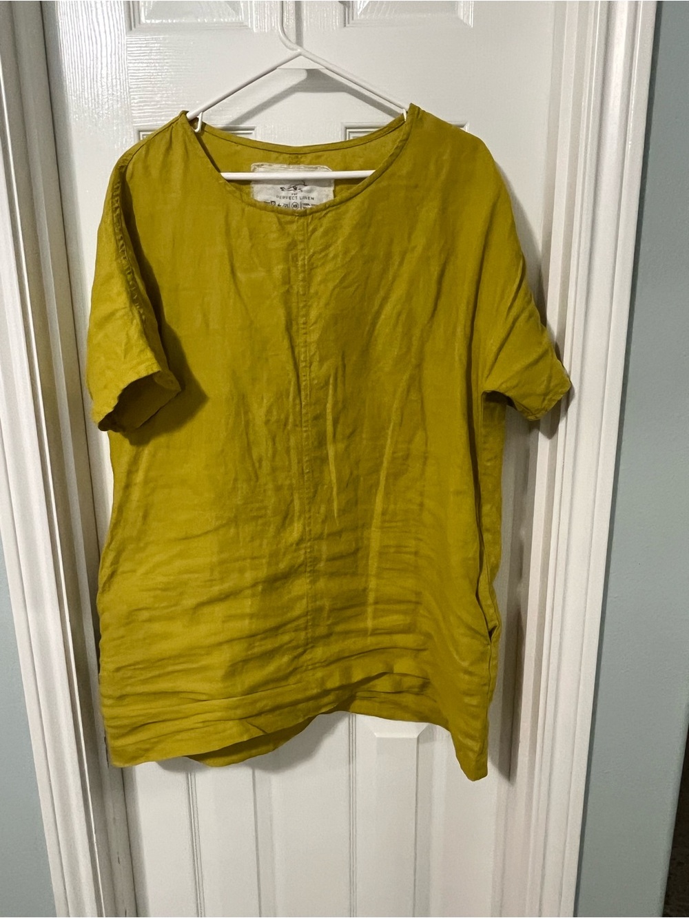 Tunic top with pockets and front seam in greenish mustard XS